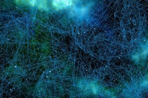 A digital network on a varied blue background