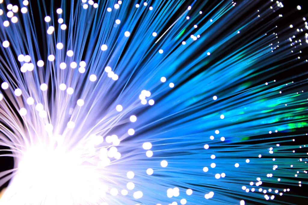 Multiple fiber-optic cables, forming a brightly lit network